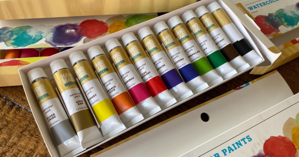 watercolor pain set on wood table