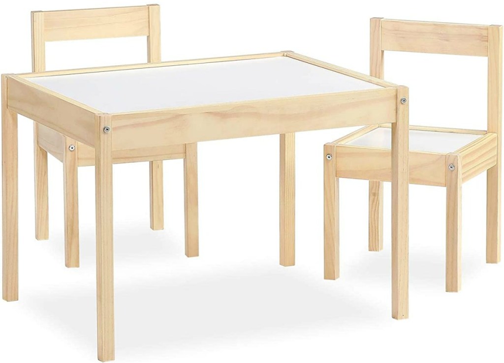 Light colored wooden table with matching chairs