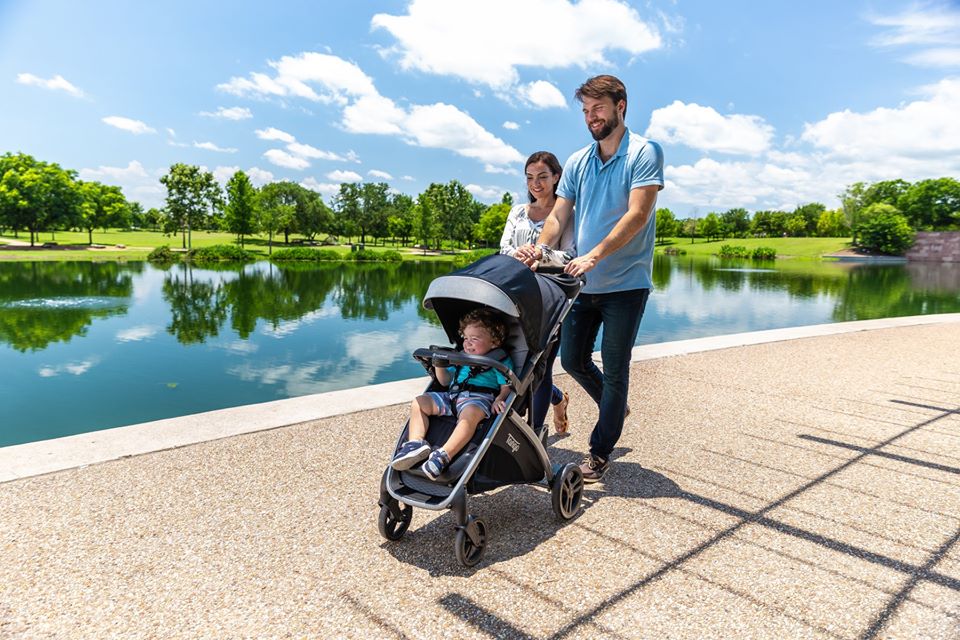 couple pushing a stroller