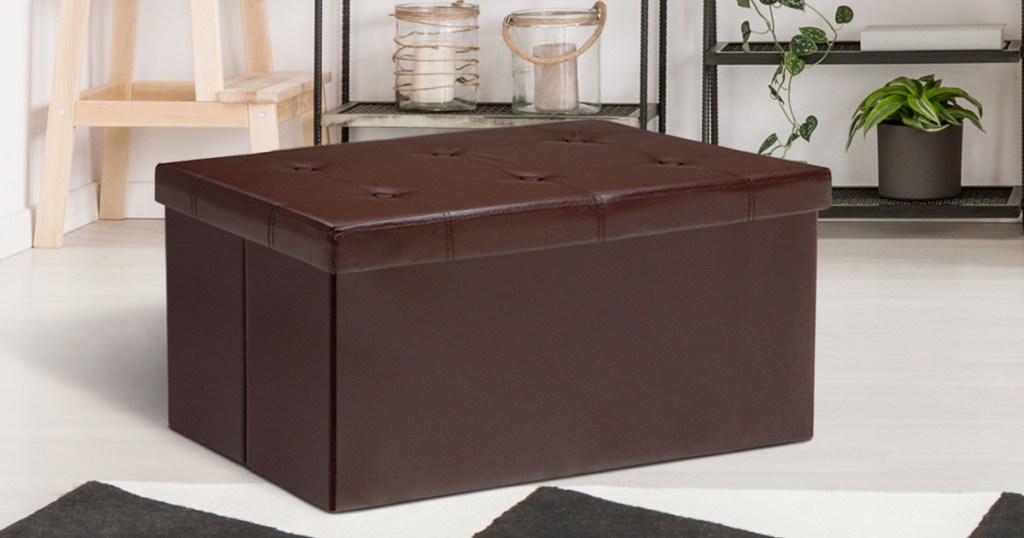 brown faux leather storage ottoman with six buttons on top lid