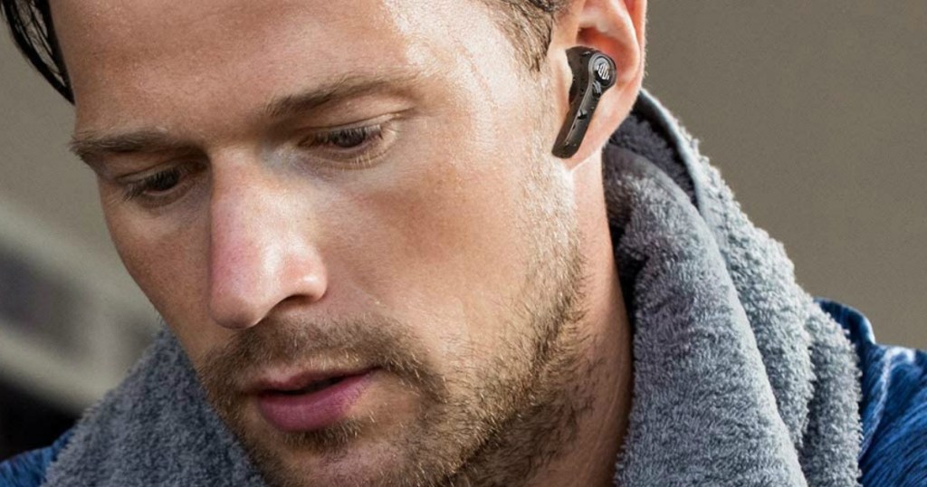 man wearing an earbud