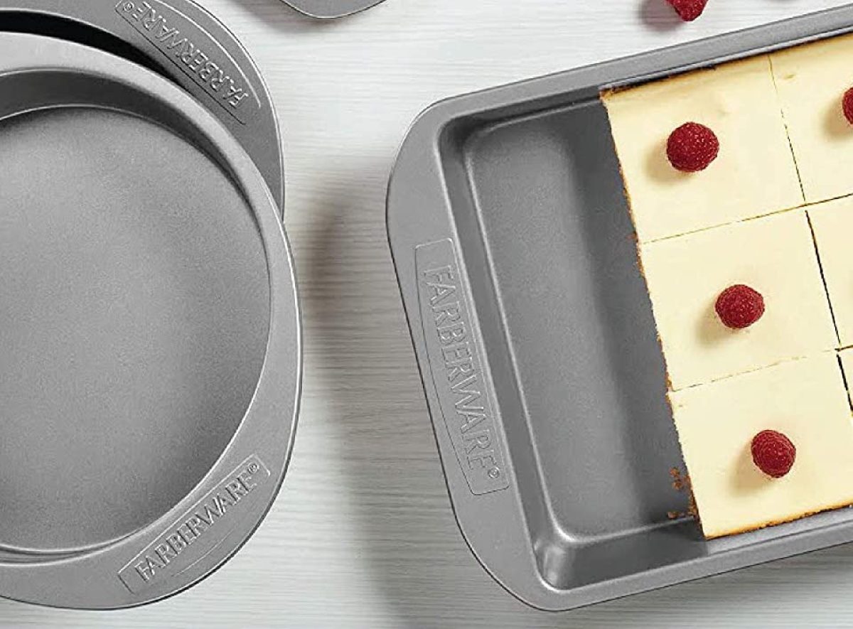 two pans and one has cheesecake in it