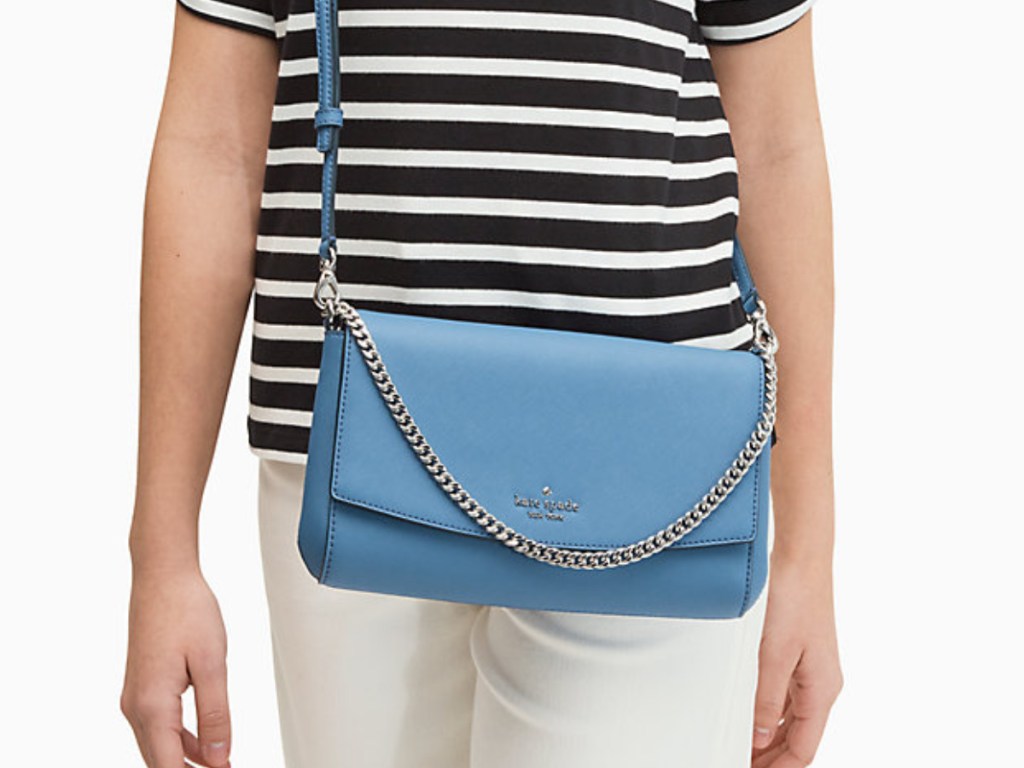 woman holding Kate Spade Bag