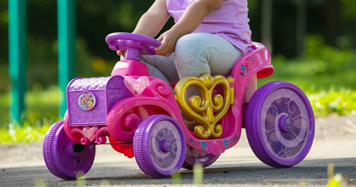 girl riding on a princess quad