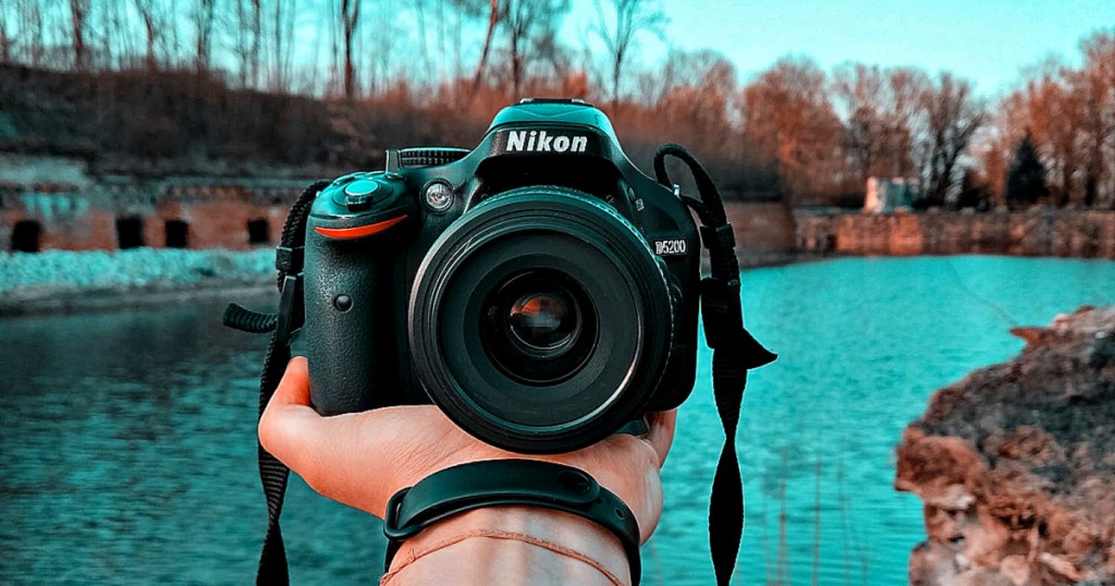 Nikon camera in man's hand