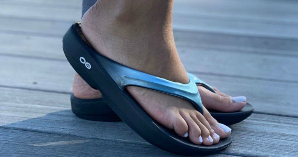 woman wearing a pair of sandals