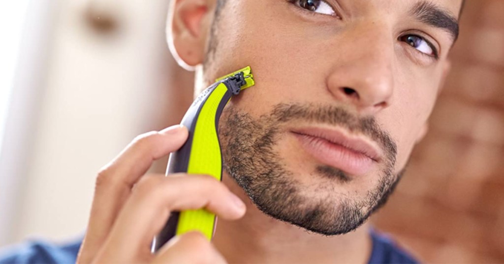 Man shaving his face