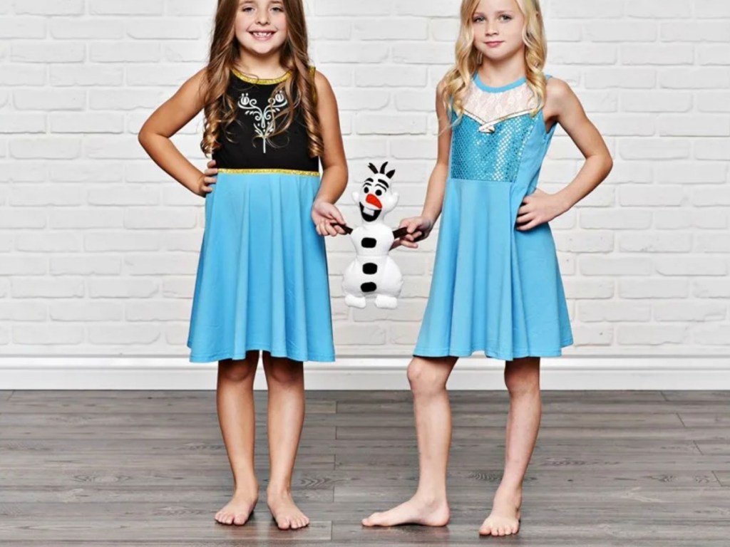 Girls wearing Disney Frozen themed dresses