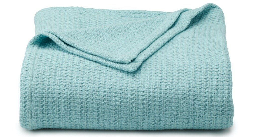 teal blue blanket folded