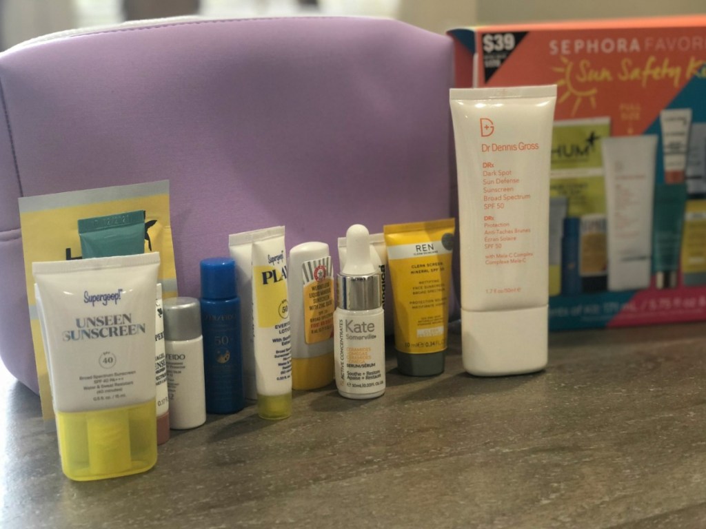 Sunscreen bottles from Sephora Sun Kit on table
