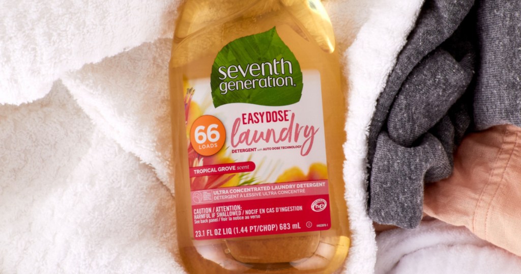 large bottle of laundry detergent on pile of laundry