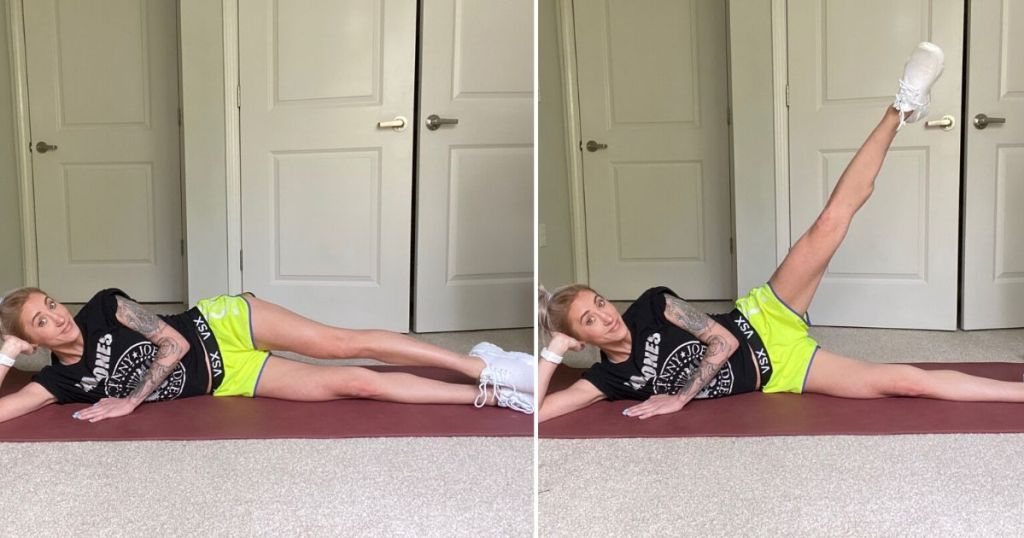 Woman laying on a yoga mat demonstrating side leg raises