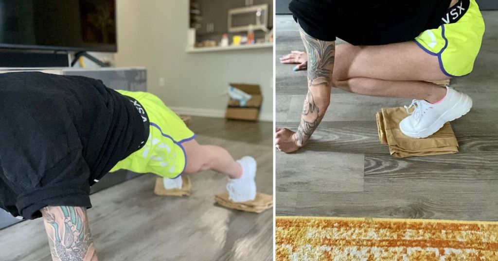 Woman demonstrating slider knee tucks with pillow cases under feet