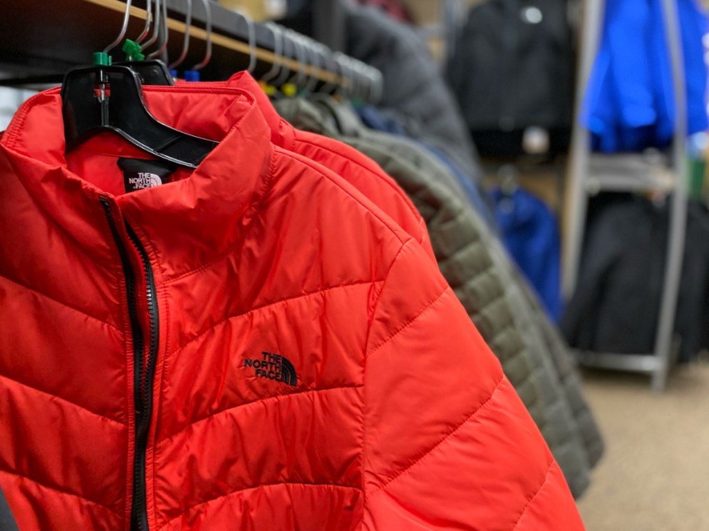 Red North Face Jacket on hanger