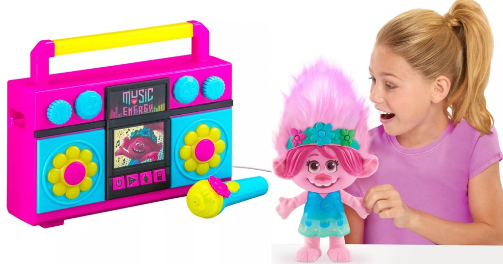 trolls themed kids boombox and girl playing with pink trolls doll