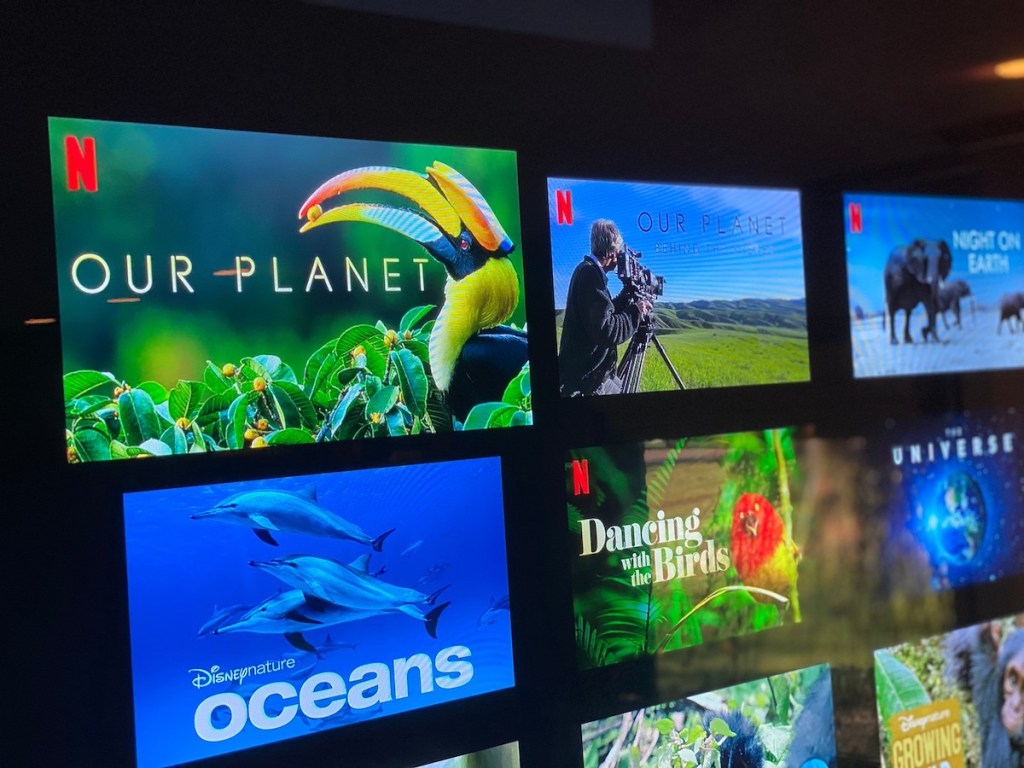 close up of tv screen with colorful planet documentaries
