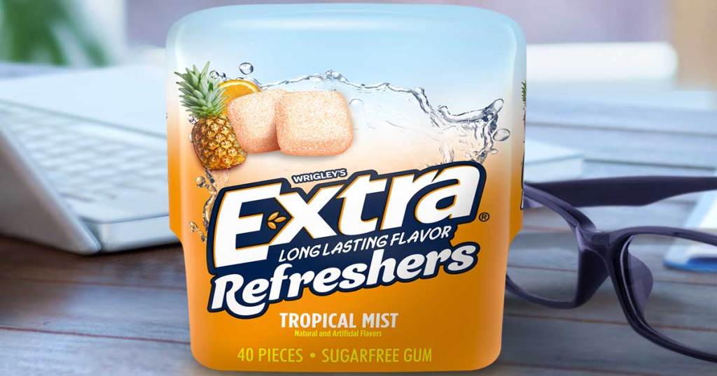 extra refreshers gum 40 piece pack on a desk by a computer and glasses