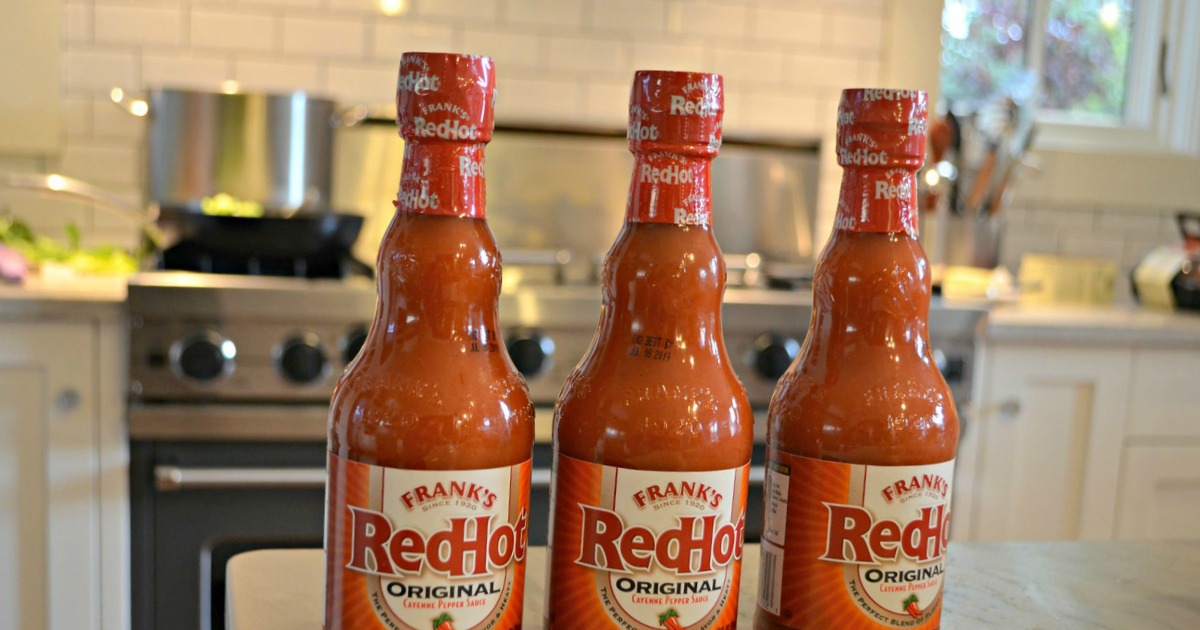 bottles of hot sauce on a counter