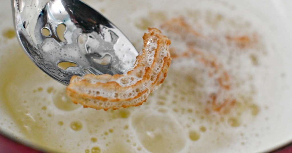 frying piped dough in oil