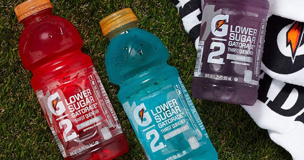 gatorade 3 flavors laying on grass with gatorade towel