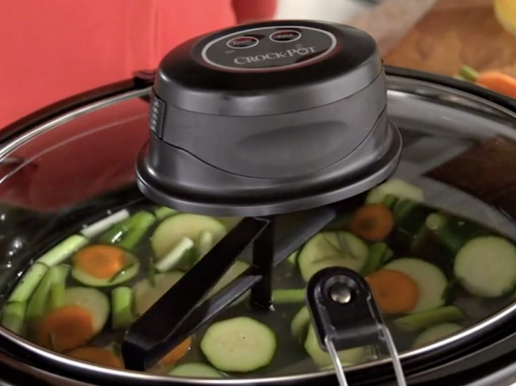 auto-stir slow cooker filled with vegetables