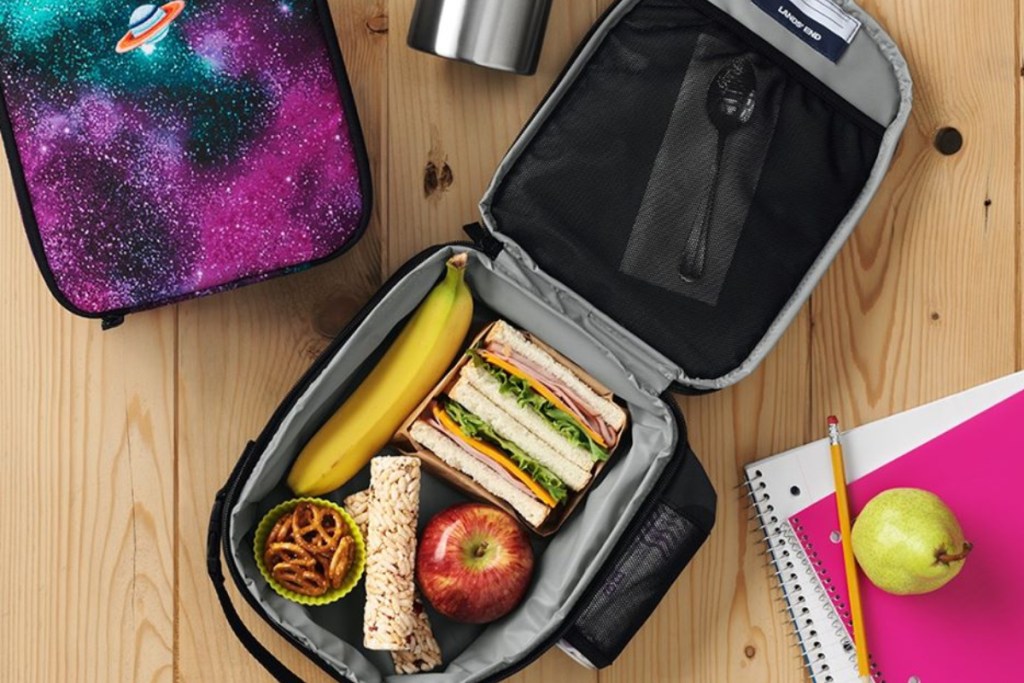 lands end lunchbox opened on table with food in it