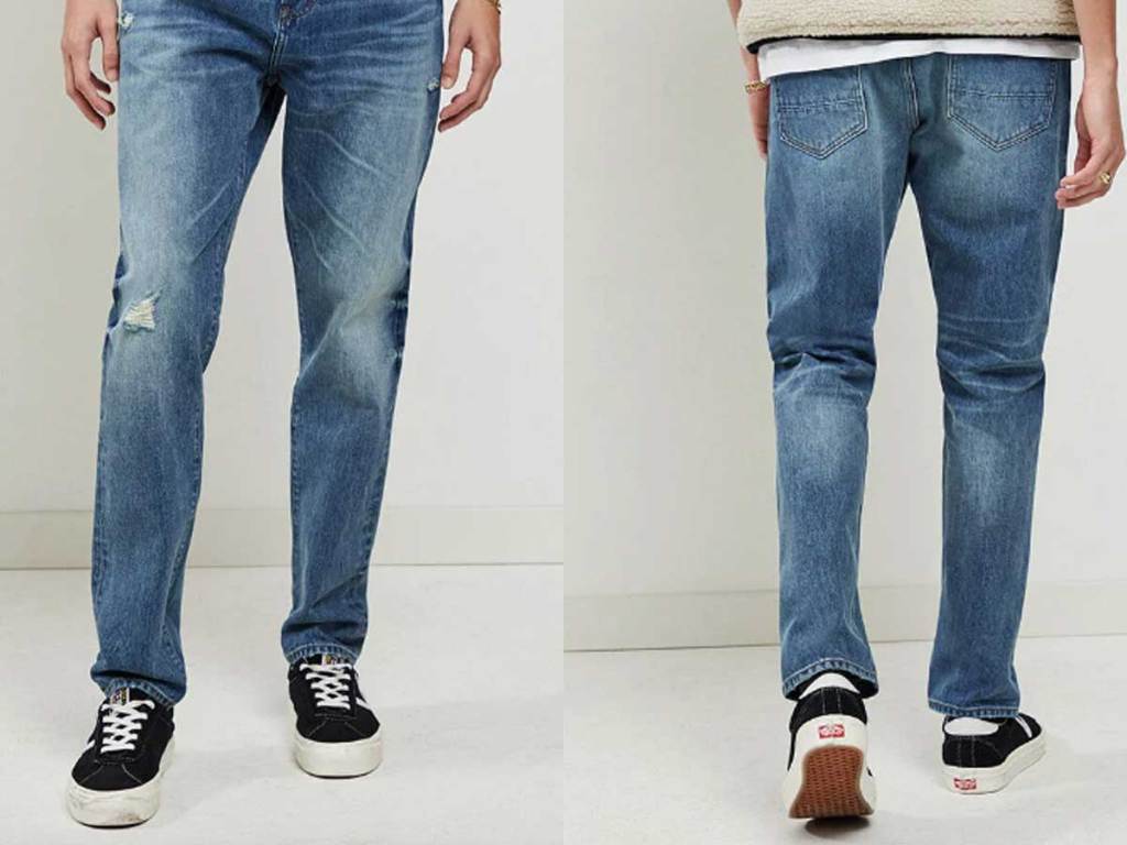 male wearing a pair of jeans with front and back images