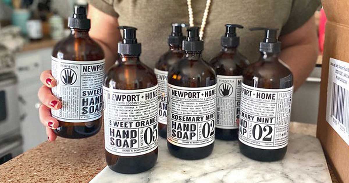 hand soap bottles eight and woman holding one on counter