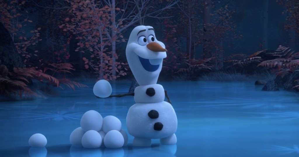 Olaf holding a snowball