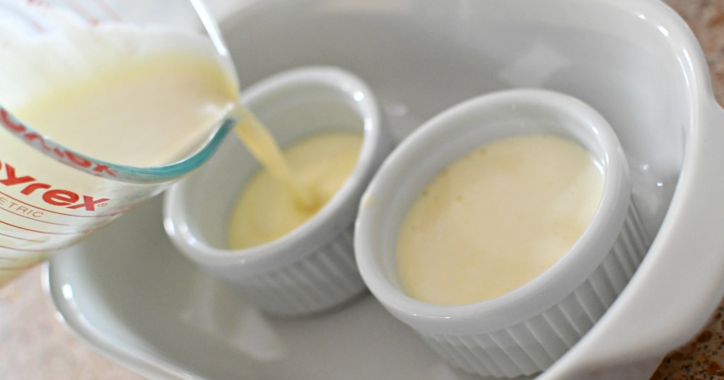 pouring creme brulee into ramekins