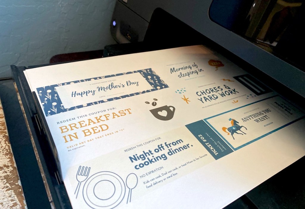 printer with sheet of mother's day coupons 