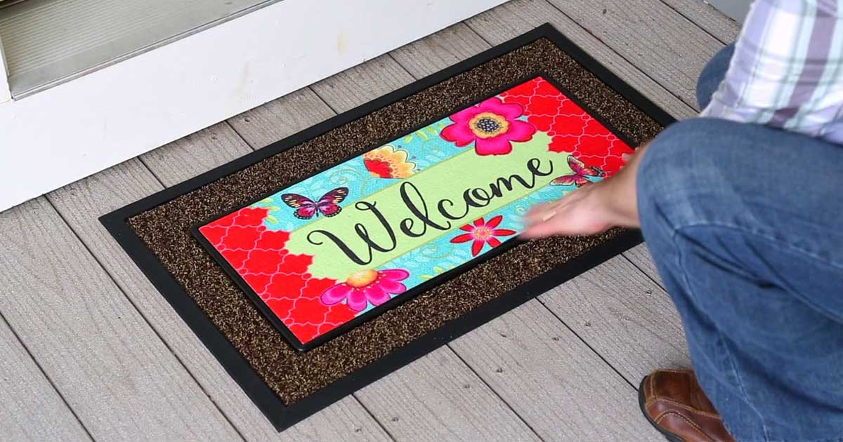 welcome doormat at the front door 