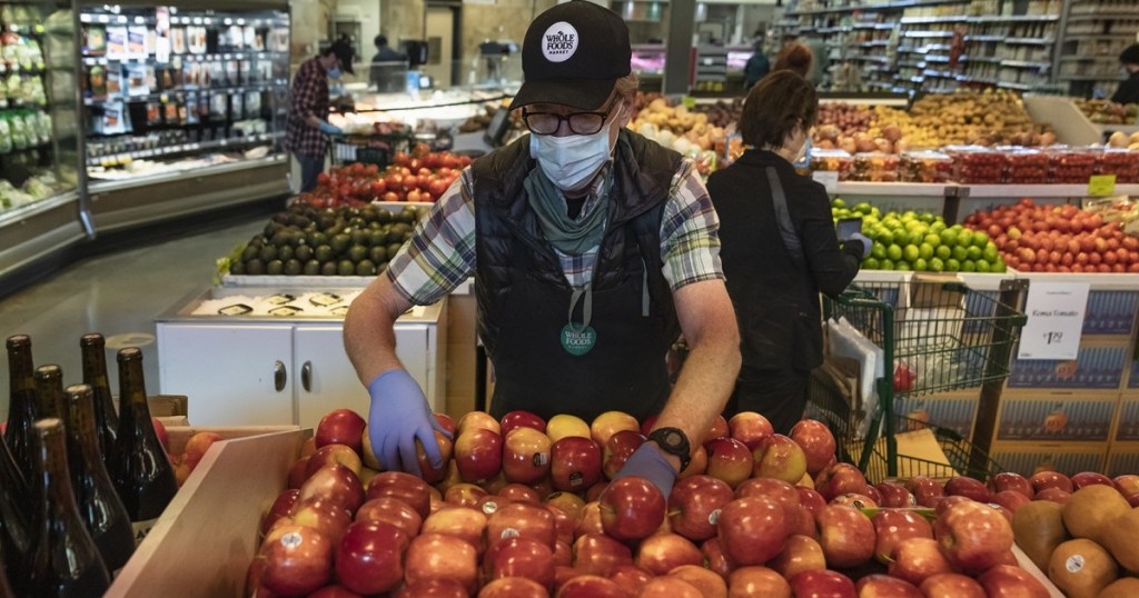 Whole Foods team member wearing mask