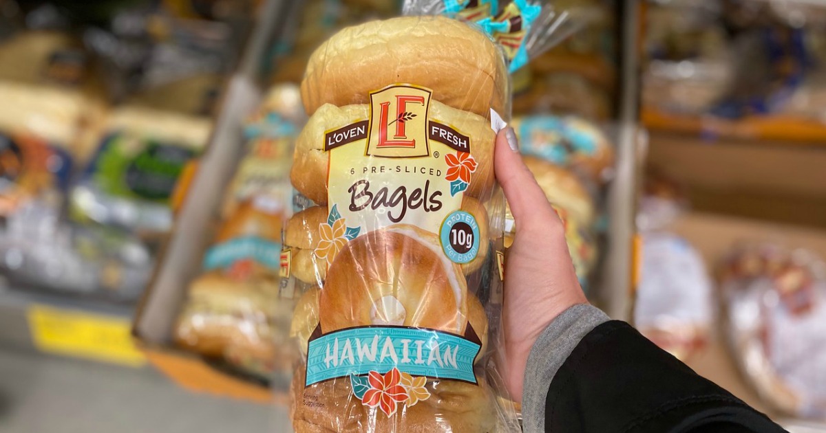 woman holding a bag of ALDI Hawaiian bagels