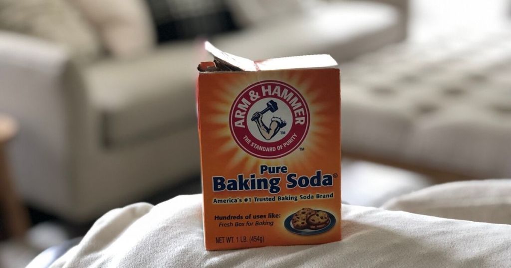 Arm & Hammer baking soda box on couch arm