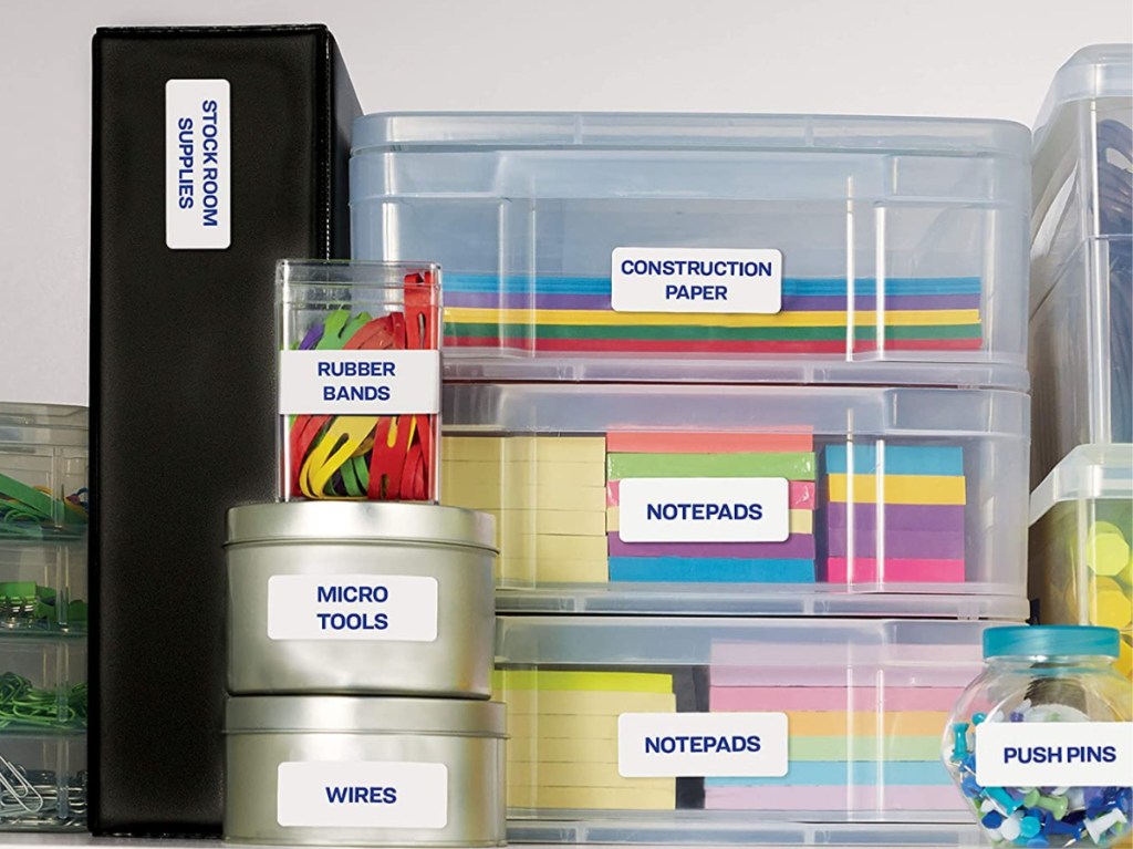organization containers filled with folders, papers, and other office supplies on shelf