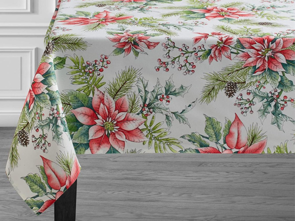 poinsettia tablecloth on dark table
