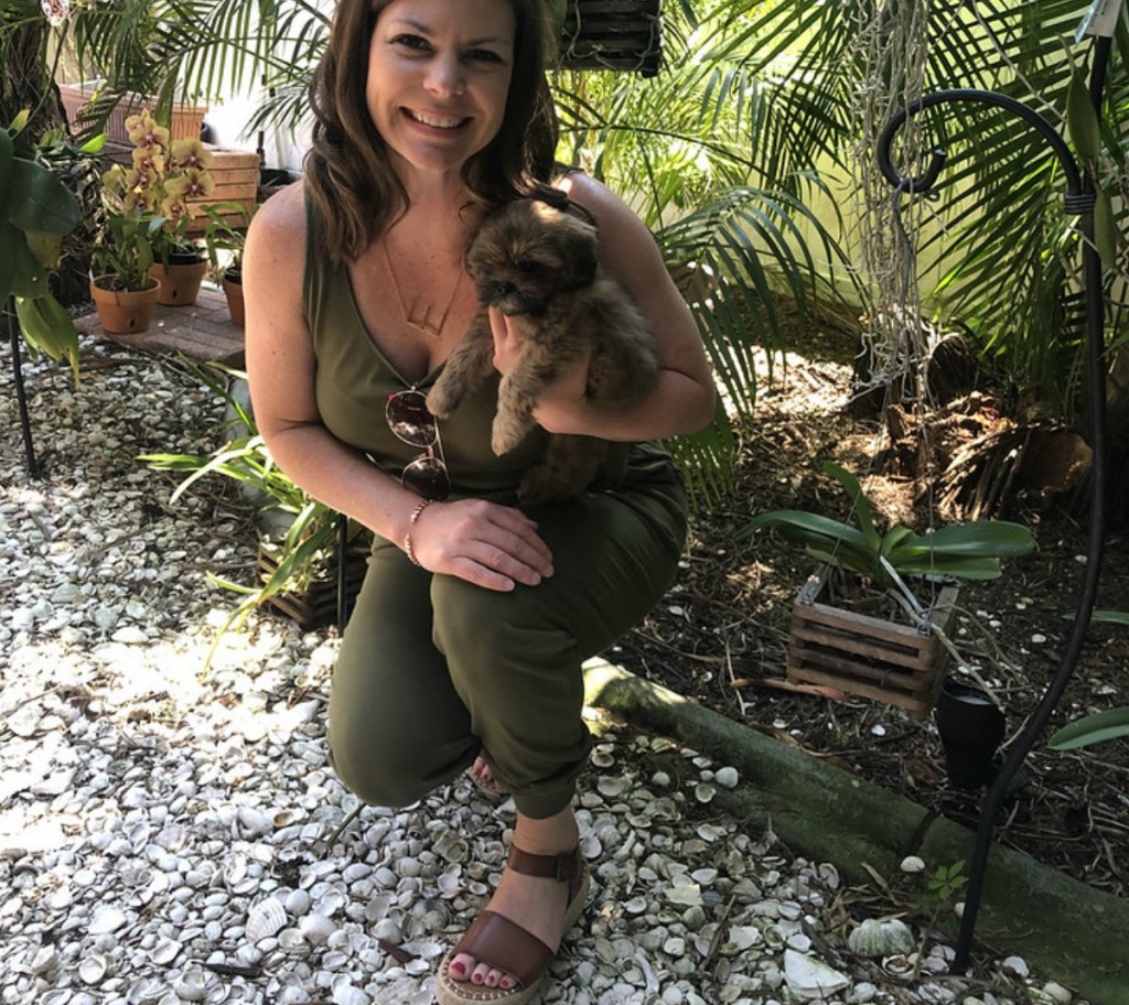 Woman wearing a green jumpsuit womens jumpsuits and rompers