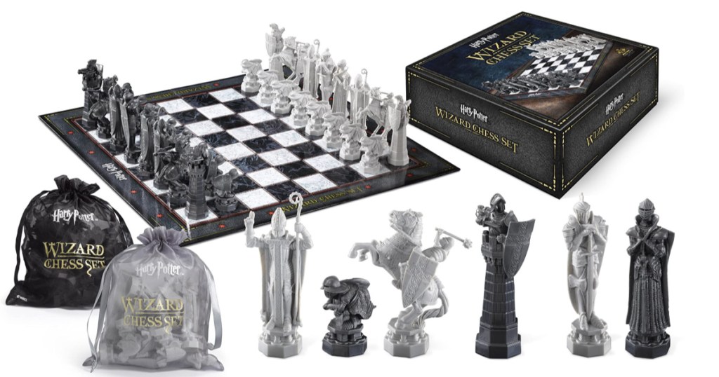 Harry Potter Chess Set with chess pieces in front, board and box