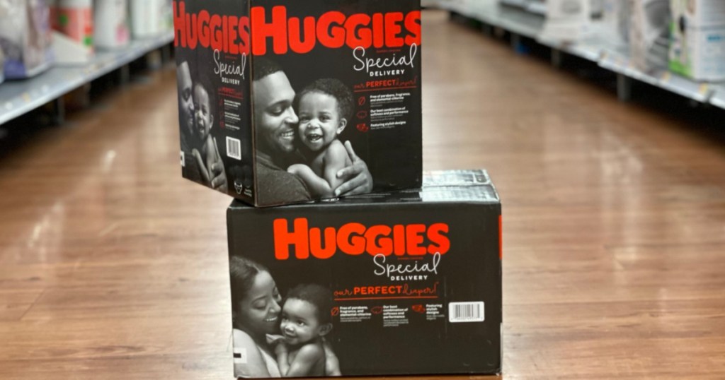 two boxes Huggies Special Delivery Boxed Diapers sitting on the store floor