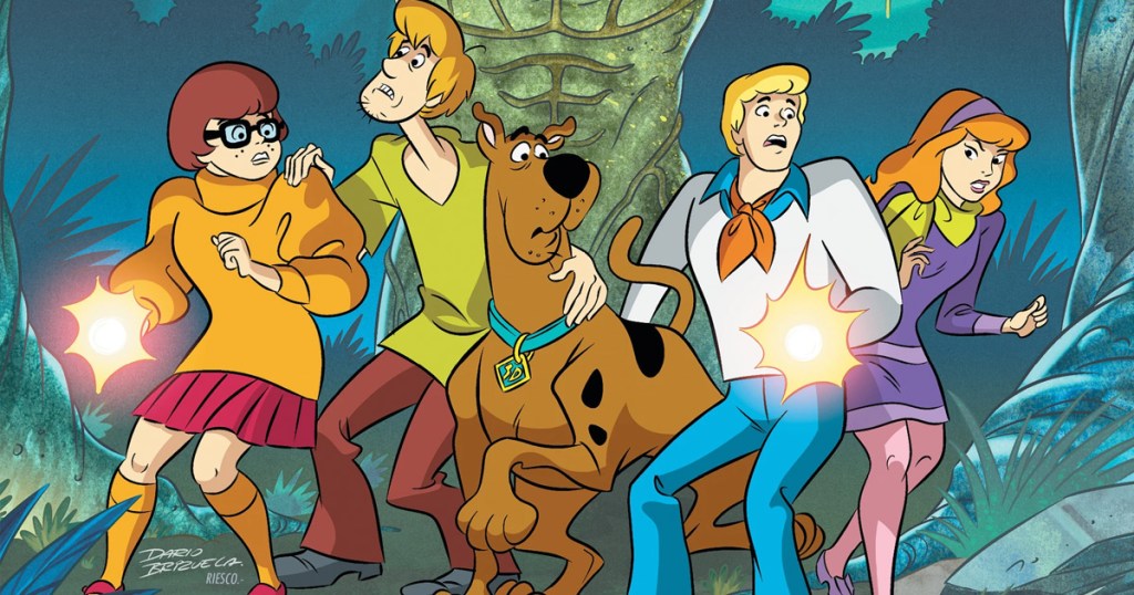 Scooby-Doo gang in front os swamp monster