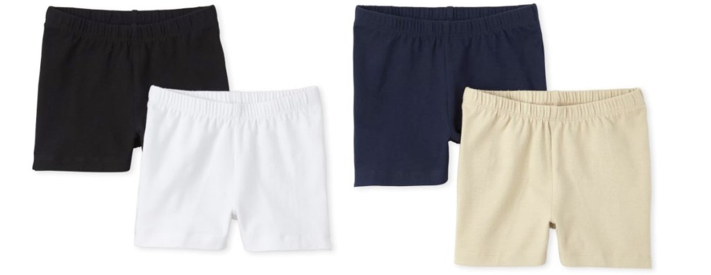 two 2-packs of girls shorts in black, white, and tan colors