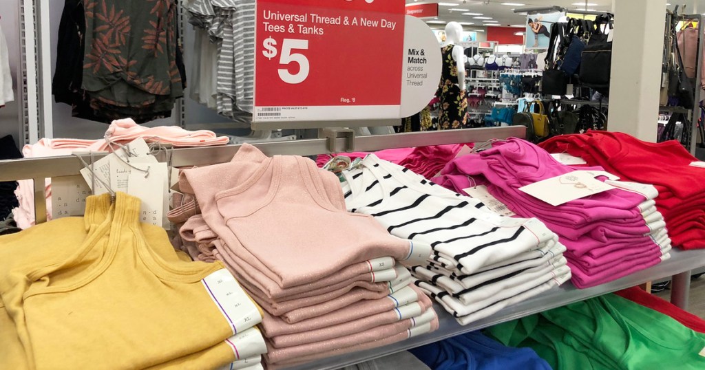 store display table of various colors of womens tank tops