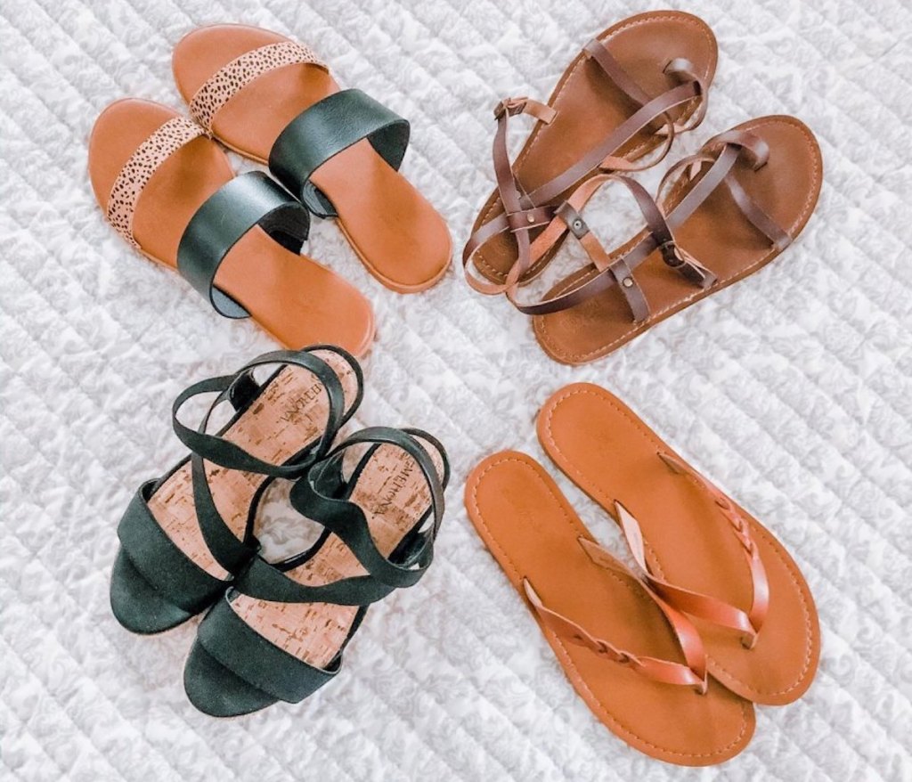 four pairs of target universal thread sandals in brown, black, dark down, and leopard