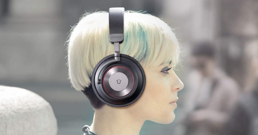 woman with blonde hair wearing Utaxo Bluetooth Noise Cancelling Headphones