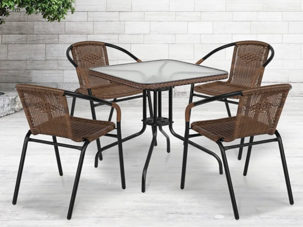 brown and black 5 piece outdoor patio dining set