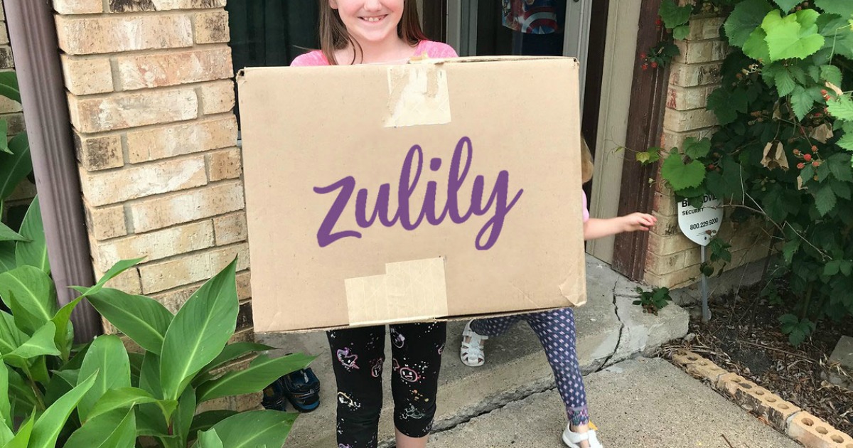 New zulily shipping box in hands of young girl