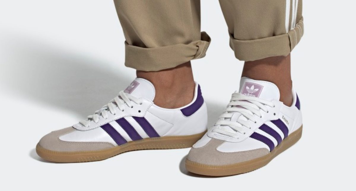 man in white, tan, and purple shoes