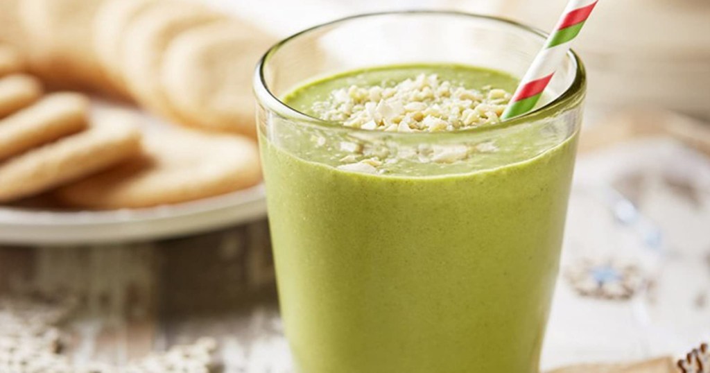 amazing green superfood smoothie with straw