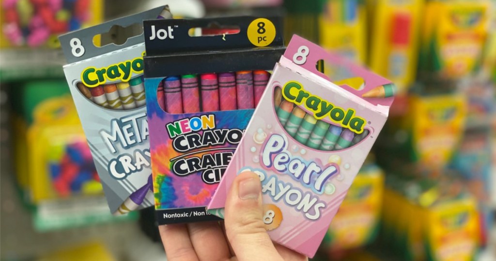 crayola crayons in hand at dollar tree